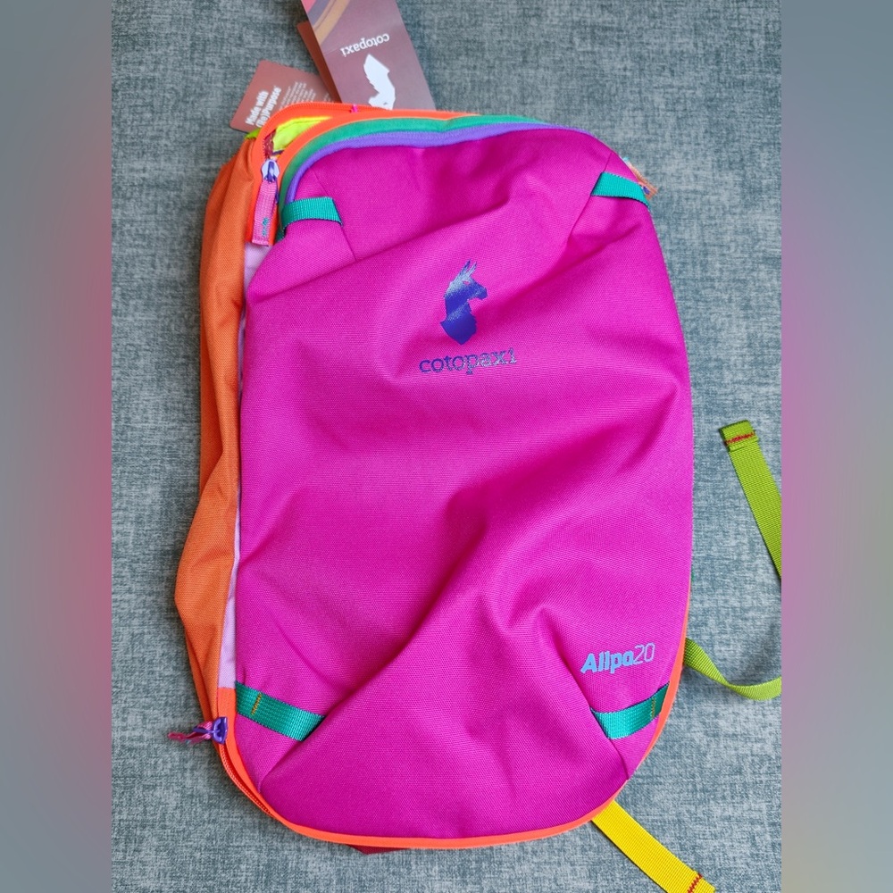 cotopaxi Pink and Orange Allpa 20L Backpack with Teal Accents